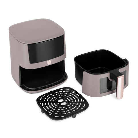 Product image of Air fryer 5L visible window. Part of the Taupe Collection . Features: • Power: 220-240V ~ 1400W • Temperature control: 40-200℃ • Include: • XL SIZE: food basket with non-stick coating 5L • DIGITAL • Color: matt taupe. (Studio view). Official Berlinger Haus product, boosted by Promintra sl.
