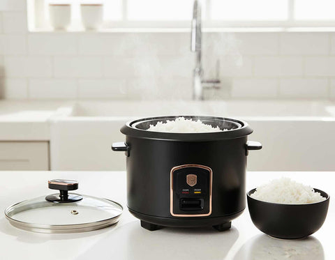 Product image of Electric rice cooker. Part of the Black Rose Collection . Features: • Material: stainless steel, aluminum, glass, plastic • 220-240V 50 / 60Hz 700W • Capacity: 1,8L, 10 cups • Length of power cord: 110 cm • Color: b.... (Studio view). Official Berlinger Haus product, boosted by Promintra sl.