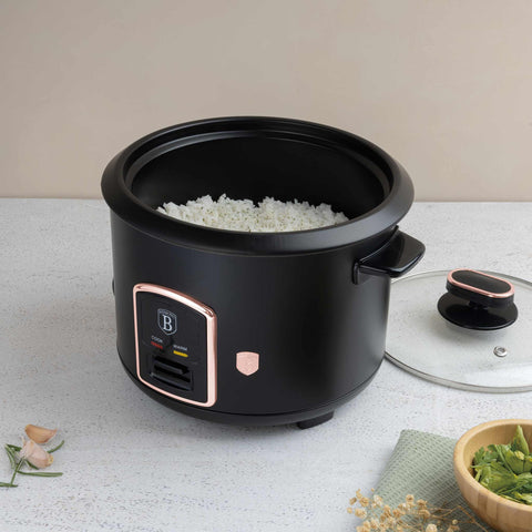 Product image of Electric rice cooker. Part of the Black Rose Collection . Features: • Material: stainless steel, aluminum, glass, plastic • 220-240V 50 / 60Hz 700W • Capacity: 1,8L, 10 cups • Length of power cord: 110 cm • Color: b.... (Studio view). Official Berlinger Haus product, boosted by Promintra sl.
