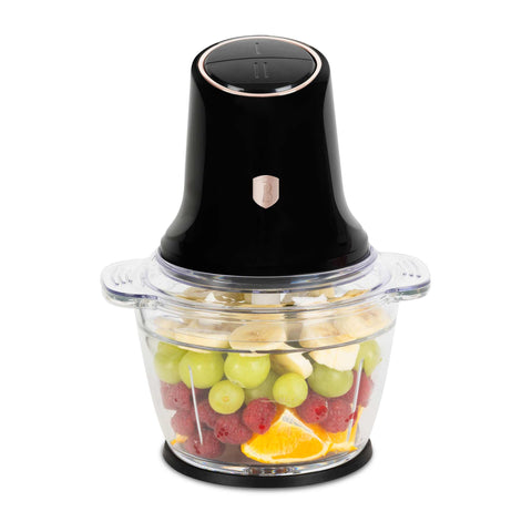 Product image of Multi chopper with glass bowl. Part of the Black Rose Collection . Features: • Material: stainless steel, glass, plastic • Power: 500 W • 220-240 V 50 Hz • Bowl capacity: 1,3L • Working capacity: 1L • Color: black- rose gold. (Studio view). Official Berlinger Haus product, boosted by Promintra sl.
