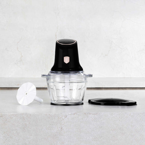 Product image of Multi chopper with glass bowl. Part of the Black Rose Collection . Features: • Material: stainless steel, glass, plastic • Power: 500 W • 220-240 V 50 Hz • Bowl capacity: 1,3L • Working capacity: 1L • Color: black- rose gold. (Studio view). Official Berlinger Haus product, boosted by Promintra sl.