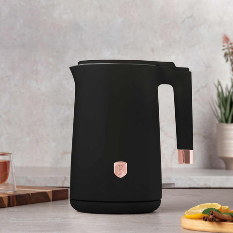 Product image of Double wall kettle. Part of the Black Rose Collection . Features: • Material: 18/10 stainless steel inside, plastic outside • Capacity: 1,7L • Voltage: 220-240V,50/60Hz • Power: 1800 W • Color: black- rose gold. (Studio view). Official Berlinger Haus product, boosted by Promintra sl.