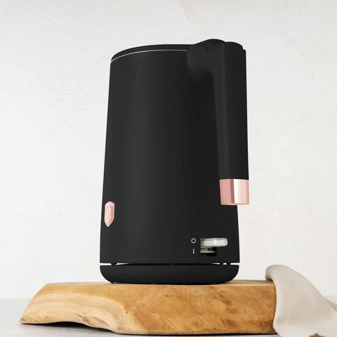 Product image of Double wall kettle. Part of the Black Rose Collection . Features: • Material: 18/10 stainless steel inside, plastic outside • Capacity: 1,7L • Voltage: 220-240V,50/60Hz • Power: 1800 W • Color: black- rose gold. (Studio view). Official Berlinger Haus product, boosted by Promintra sl.