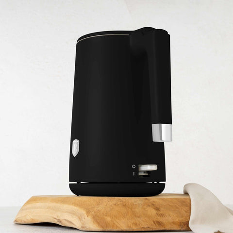 Product image of Double wall kettle. Part of the Black Vantage Collection/Matte Black Collection/Black Silver Collection . Features: • Material: 18/10 stainless steel inside, plastic outside • Capacity: 1,7L • Voltage: 220-240V,50/60Hz • Power: 1800 W • Color: matt black. (Studio view). Official Berlinger Haus product, boosted by Promintra sl.