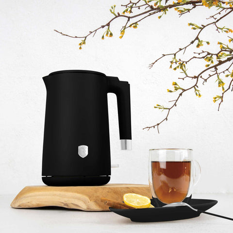 Product image of Double wall kettle. Part of the Black Vantage Collection/Matte Black Collection/Black Silver Collection . Features: • Material: 18/10 stainless steel inside, plastic outside • Capacity: 1,7L • Voltage: 220-240V,50/60Hz • Power: 1800 W • Color: matt black. (Studio view). Official Berlinger Haus product, boosted by Promintra sl.