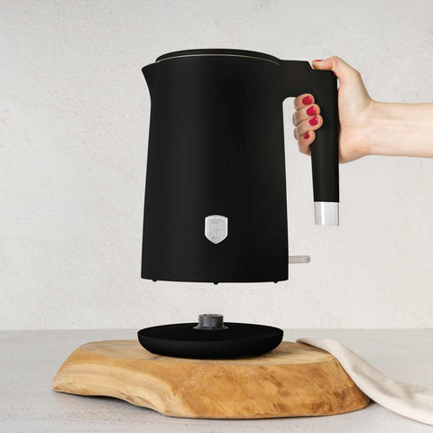 Product image of Double wall kettle. Part of the Black Vantage Collection/Matte Black Collection/Black Silver Collection . Features: • Material: 18/10 stainless steel inside, plastic outside • Capacity: 1,7L • Voltage: 220-240V,50/60Hz • Power: 1800 W • Color: matt black. (Studio view). Official Berlinger Haus product, boosted by Promintra sl.