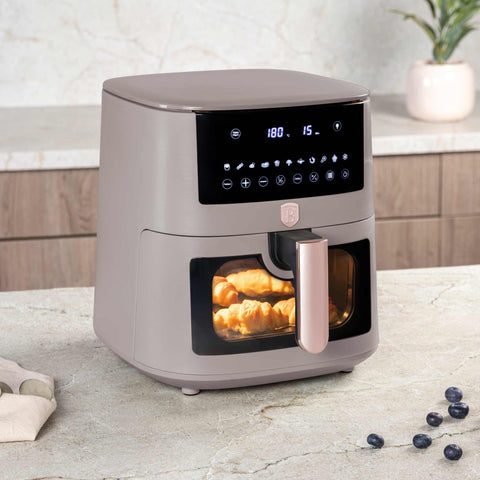Product image of Air fryer 8L visible window. Part of the Taupe Collection . Features: • Power: 220-240V ~ 50/60Hz 1650W • Temperature control: 40-200℃ • XXXL SIZE: Food basket with non-stick coating 8L • DIGITAL • Size: 38,8*30*32,4 .... (Studio view). Official Berlinger Haus product, boosted by Promintra sl.