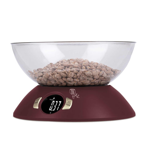 Product image of Kitchen scale with bowl. Part of the Leonardo Collection . Features: • Material: plastic • LCD display • Capacity: 5 kg • AAA battery included • Accessories: • Measuring cup: 25 ml • Egg separator • Color: matt bordeaux. (Studio view). Official Berlinger Haus product, boosted by Promintra sl.