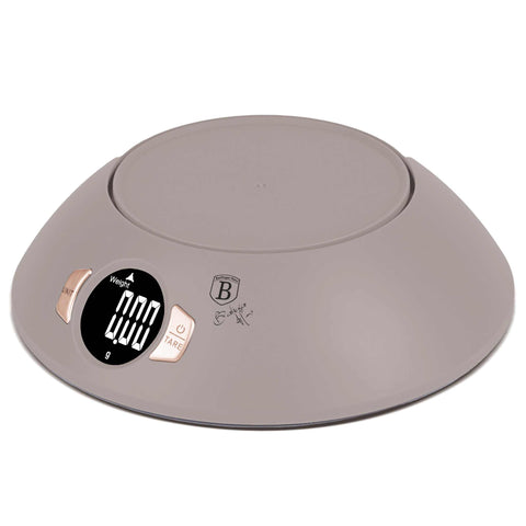 Product image of Kitchen scale with bowl. Part of the Taupe Collection . Features: • Material: plastic • LCD display • Capacity: 5 kg • AAA battery included • Accessories: • Measuring cup: 25 ml • Egg separator • Color: matt taupe. (Conceptual view). Official Berlinger Haus product, boosted by Promintra sl.