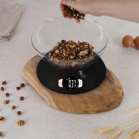 Product image of Kitchen scale with bowl. Part of the Black Rose Collection . Features: • Material: plastic • LCD display • Capacity: 5 kg • AAA battery included • Accessories: • Measuring cup: 25 ml • Egg separator • Color: black- ros.... (Conceptual view). Official Berlinger Haus product, boosted by Promintra sl.