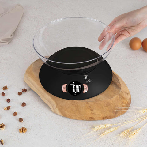 Product image of Kitchen scale with bowl. Part of the Black Rose Collection . Features: • Material: plastic • LCD display • Capacity: 5 kg • AAA battery included • Accessories: • Measuring cup: 25 ml • Egg separator • Color: black- ros.... (Conceptual view). Official Berlinger Haus product, boosted by Promintra sl.