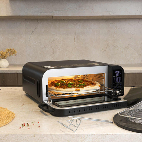 Product image of Pizza oven. Part of the Black Rose Collection . Features: • Power: 2000W • Voltage: 220-240 V • Capacity: 18 L (12" pizza) • 6 accessories: • Oven rack • Aluminium bottom tray • Chrome air fry basket • Dou.... (Studio view). Official Berlinger Haus product, boosted by Promintra sl.
