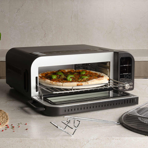 Product image of Pizza oven. Part of the Black Rose Collection . Features: • Power: 2000W • Voltage: 220-240 V • Capacity: 18 L (12" pizza) • 6 accessories: • Oven rack • Aluminium bottom tray • Chrome air fry basket • Dou.... (Studio view). Official Berlinger Haus product, boosted by Promintra sl.