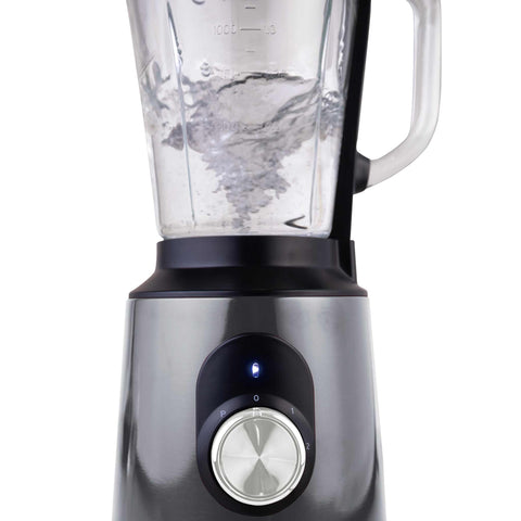 Imatge del producte de la batedora de taula amb recipient de VIDRE d'1,5 L i 1000 W. Forma part de la Metallic Line Carbon Pro Edition. Característiques: • Material: acer inoxidable, vidre, plàstic • Potència: 1000 W • Voltatge: 220-240 V, 50-60 Hz • Recipient de vidre d'1,5 L amb doble sistema de bloqueig de seguretat (ambdós en...). (Vista d'estudi) per a la marca oficial de Berlinger Haus.
