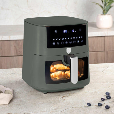Product image of Air fryer 8L visible window. Part of the Matte Green Collection . Features: • Power: 220-240V ~ 50/60Hz 1650W • Temperature control: 40-200℃ • XXXL SIZE: Food basket with non-stick coating 8L • DIGITAL • Size: 38,8*30*32,4 .... (Studio view). Official Berlinger Haus product, boosted by Promintra sl.