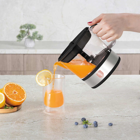 Product image of Electric citrus juicer. Part of the Black Rose Collection . Features: • Material: plastic, stainless steel • 220-240V/230VAC 50Hz 40W • Capacity: 0,7 L • Color: black- rose gold. (Studio view). Official Berlinger Haus product, boosted by Promintra sl.
