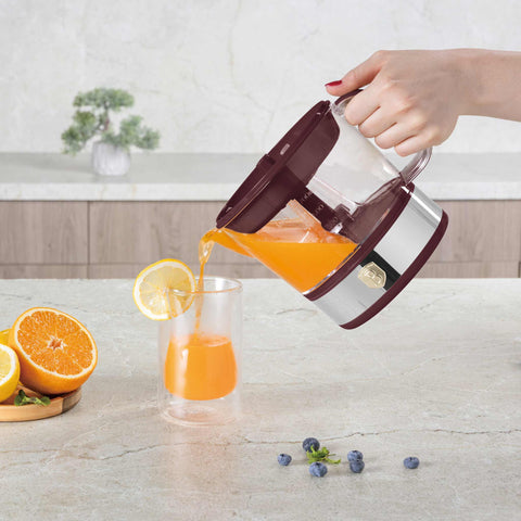 Product image of Electric citrus juicer. Part of the Leonardo Collection . Features: • Material: plastic, stainless steel • 220-240V/230VAC 50Hz 40W • Capacity: 0,7 L • Color: stainless steel- bordeaux. (Studio view). Official Berlinger Haus product, boosted by Promintra sl.