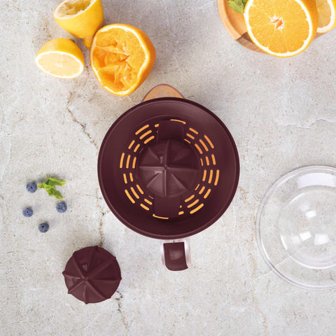 Product image of Electric citrus juicer. Part of the Leonardo Collection . Features: • Material: plastic, stainless steel • 220-240V/230VAC 50Hz 40W • Capacity: 0,7 L • Color: stainless steel- bordeaux. (Studio view). Official Berlinger Haus product, boosted by Promintra sl.