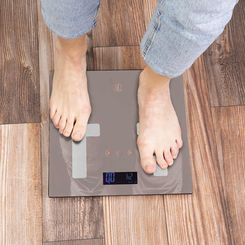 Product image of Digital bathroom BODYFAT glass scale capacity 180kg. Part of the Taupe Collection . Features: • Material: tempered glass and plastic • Capacity: 180 kg • Size: 30*30 cm • Weight unit: lb/st/kg • Auto zero and auto off • Power: 2 pcs AAA batt.... (Studio view). Official Berlinger Haus product, boosted by Promintra sl.