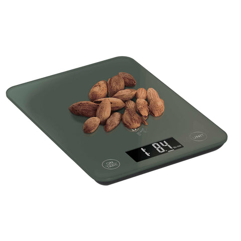 Product image of Digital glass kitchen scale capacity 5kg. Part of the Matte Green Collection . Features: • Material: tempered glass and plastic • Capacity: 5 kg • Size: 19,5*14,5 cm • Weight unit: g/oz/ml/lb/fl • 2 pcs AAA battery included • Color: green. (Studio view). Official Berlinger Haus product, boosted by Promintra sl.