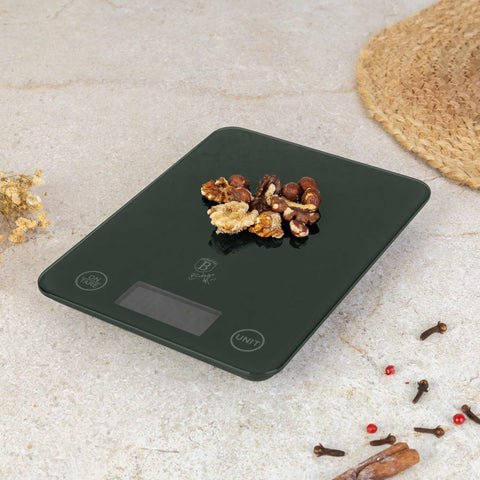 Product image of Digital glass kitchen scale capacity 5kg. Part of the Matte Green Collection . Features: • Material: tempered glass and plastic • Capacity: 5 kg • Size: 19,5*14,5 cm • Weight unit: g/oz/ml/lb/fl • 2 pcs AAA battery included • Color: green. (Studio view). Official Berlinger Haus product, boosted by Promintra sl.