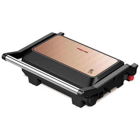 Product image of Electric grill. Part of the Metallic Line Rose Gold Edition . Features: • Power: 1000 W • Voltage: 220-240 V, 50/60Hz • Plate size: 23*14,5 cm • NON-STICK coating on plate • Ready light indicator • Length of power cord:.... (Studio view). Official Berlinger Haus product, boosted by Promintra sl.