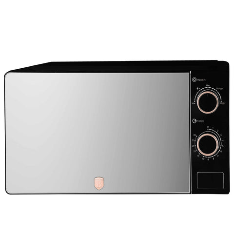 Product image of Mechanical microwave oven 20L. Part of the Black Rose Collection . Features: • Input power: 1100W • Output power: 700W • Capacity: 20L • Glass plate: Ø24,5 cm • Size: 24,2*44,5*32,5 cm • Length of power cord: 85 cm • Color: .... (Studio view). Official Berlinger Haus product, boosted by Promintra sl.