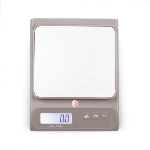 Product image of Digital kitchen scale capacity 6kg. Part of the Taupe Collection . Features: • Material: stainless steel and plastic • Capacity: 6 kg • Size: 18,8*15*4,2 cm • Weight unit: g/oz/ml/lb • 2 pcs AAA battery included • Color: taupe. (Studio view). Official Berlinger Haus product, boosted by Promintra sl.