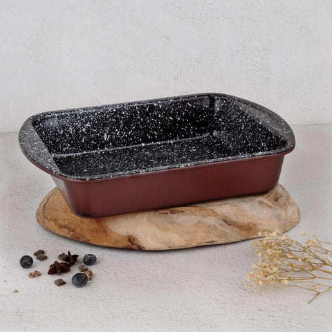 Product image of Oblong roaster 35x27cm. Part of the Blaumann/Cera Stone Collection . Features: • Material: carbon steel with non-stick coating • Size: 35*27*6,5 cm • Color: bronze. (Studio view). Official Berlinger Haus product, boosted by Promintra sl.