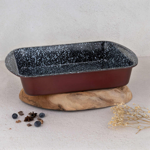 Product image of Oblong roaster 40x28cm. Part of the Blaumann/Cera Stone Collection . Features: • Material: carbon steel with non-stick coating • Size: 40*28*7 cm • Color: bronze. (Studio view). Official Berlinger Haus product, boosted by Promintra sl.
