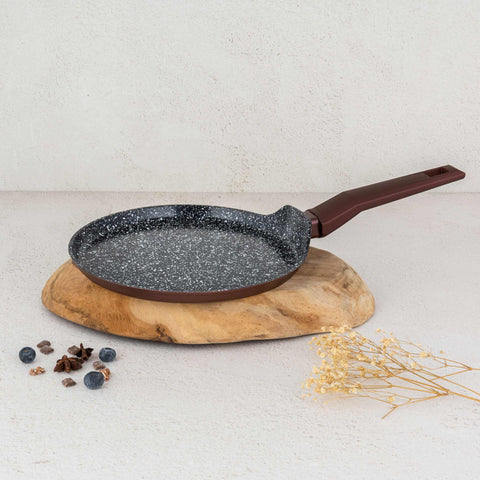 Product image of Pancake pan 25cm. Part of the Blaumann/Cera Stone Collection . Features: • Material: forged aluminum • Pancake pan Ø25*1,8 cm • Color: bronze. (Studio view). Official Berlinger Haus product, boosted by Promintra sl.