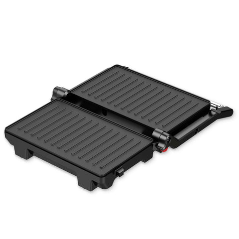 Imatge del producte de la barbacoa elèctrica. Part de la col·lecció Blaumann/Black Silver. Característiques: • Potència: 1000 W • Voltatge: 220-240 V, 50/60 Hz • Mida de la placa: 23*14,5 cm • Revestiment ANTIADHERENT a la placa • Indicador lluminós de preparació • Longitud del cable d'alimentació:... (Vista d'estudi). Producte oficial de Berlinger, impulsat per Promintra sl.