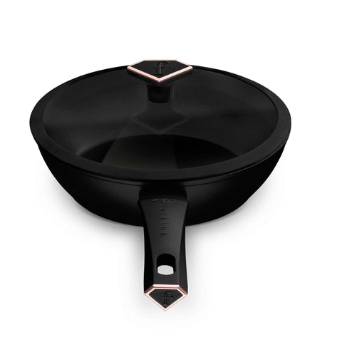 Product image of Deep frypan with lid 24cm. Part of the MATTE BLACK- ROSE GOLD . Features: • Material: forged aluminum with non-stick titanPro coating • Deep frypan with lid Ø24*6,5 cm 2,3L • Color: matt black- rose gold. (Studio view). Official Berlinger Haus product, boosted by Promintra sl.