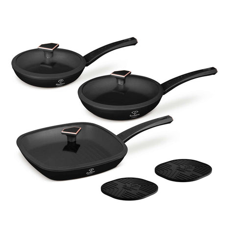Product image of 8pcs frypan set. Part of the MATTE BLACK- ROSE GOLD . Features: • Material: forged aluminum with non-stick titanPro coating • Include: • Frypan with lid Ø20*4,5 cm 1,0L • Frypan with lid Ø24*4,8 cm 1,7L • Grill .... (Studio view). Official Berlinger Haus product, boosted by Promintra sl.