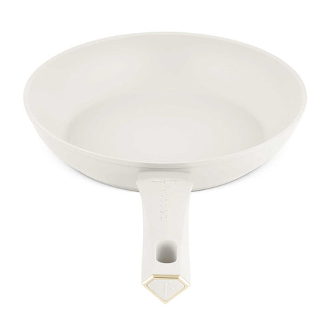 Product image of Frypan 24cm. Part of the MATTE CREAM- GOLD . Features: • Material: forged aluminum with non-stick titanPro coating • Frypan Ø24*4,8 cm 1,7L • Color: matt cream- gold. (Studio view). Official Berlinger Haus product, boosted by Promintra sl.