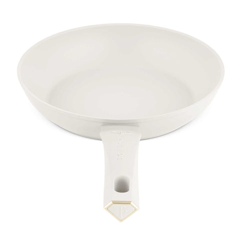 Product image of Frypan 24cm. Part of the MATTE CREAM- GOLD . Features: • Material: forged aluminum with non-stick titanPro coating • Frypan Ø24*4,8 cm 1,7L • Color: matt cream- gold. (Studio view). Official Berlinger Haus product, boosted by Promintra sl.