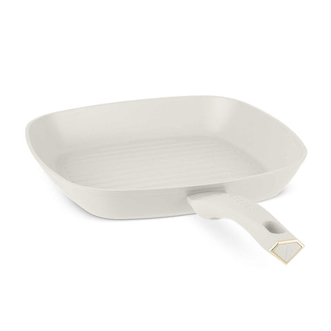 Product image of Grill pan 28cm. Part of the MATTE CREAM- GOLD . Features: • Material: forged aluminum with non-stick titanPro coating • Grill pan Ø28*4,1 cm 2,1L • Color: matt cream- gold. (Studio view). Official Berlinger Haus product, boosted by Promintra sl.