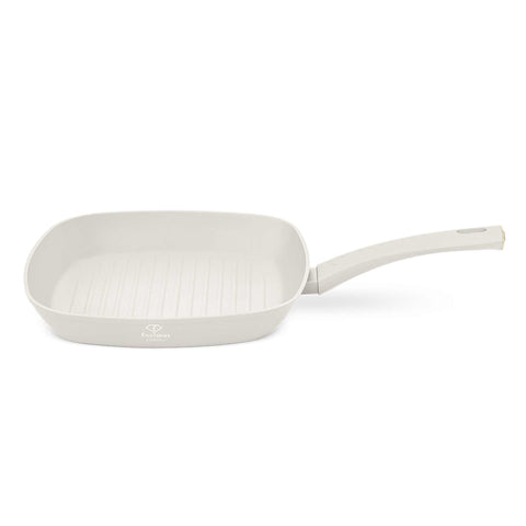 Product image of Grill pan 28cm. Part of the MATTE CREAM- GOLD . Features: • Material: forged aluminum with non-stick titanPro coating • Grill pan Ø28*4,1 cm 2,1L • Color: matt cream- gold. (Studio view). Official Berlinger Haus product, boosted by Promintra sl.