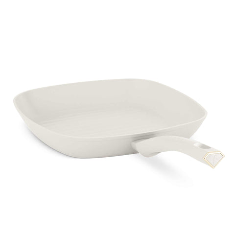 Product image of Grill pan 28cm. Part of the MATTE CREAM- GOLD . Features: • Material: forged aluminum with non-stick titanPro coating • Grill pan Ø28*4,1 cm 2,1L • Color: matt cream- gold. (Studio view). Official Berlinger Haus product, boosted by Promintra sl.