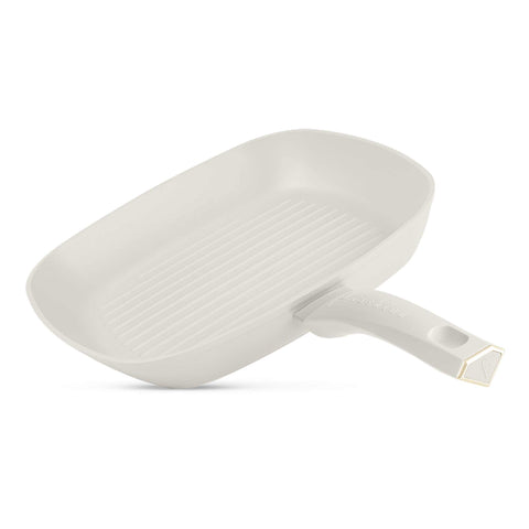 Product image of Grill pan 28cm. Part of the MATTE CREAM- GOLD . Features: • Material: forged aluminum with non-stick titanPro coating • Grill pan Ø28*4,1 cm 2,1L • Color: matt cream- gold. (Studio view). Official Berlinger Haus product, boosted by Promintra sl.