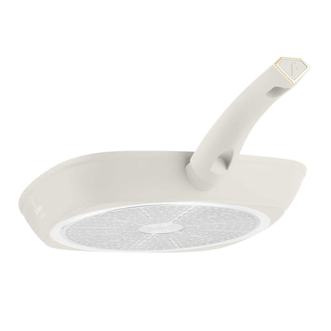 Product image of Grill pan 28cm. Part of the MATTE CREAM- GOLD . Features: • Material: forged aluminum with non-stick titanPro coating • Grill pan Ø28*4,1 cm 2,1L • Color: matt cream- gold. (Studio view). Official Berlinger Haus product, boosted by Promintra sl.