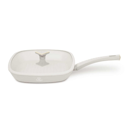 Product image of Grill pan with lid 28cm. Part of the MATTE CREAM- GOLD . Features: • Material: forged aluminum with non-stick titanPro coating • Grill pan with lid Ø28*4,1 cm 2,1L • Color: matt cream- gold. (Studio view). Official Berlinger Haus product, boosted by Promintra sl.