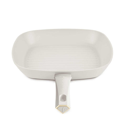 Product image of Grill pan with lid 28cm. Part of the MATTE CREAM- GOLD . Features: • Material: forged aluminum with non-stick titanPro coating • Grill pan with lid Ø28*4,1 cm 2,1L • Color: matt cream- gold. (Studio view). Official Berlinger Haus product, boosted by Promintra sl.