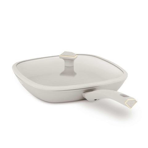 Product image of Grill pan with lid 28cm. Part of the MATTE CREAM- GOLD . Features: • Material: forged aluminum with non-stick titanPro coating • Grill pan with lid Ø28*4,1 cm 2,1L • Color: matt cream- gold. (Studio view). Official Berlinger Haus product, boosted by Promintra sl.