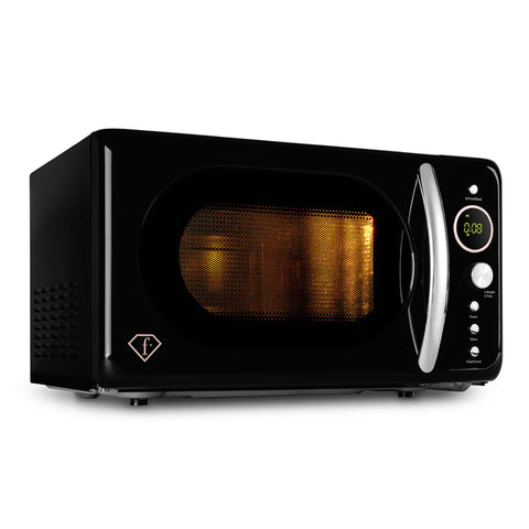 Product image of Digital microwave oven 20L. Part of the MATTE BLACK- ROSE GOLD . Features: • Input power: 1200W/ 2450 MHz • Output power: 700W • Capacity: 20L • Glass plate: Ø24,5 cm • Length of power cord: 100 cm • Color: black- rose gold. (Studio view). Official Berlinger Haus product, boosted by Promintra sl.