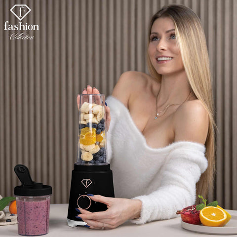 Product image of Smoothie maker. Part of the MATTE BLACK- ROSE GOLD . Features: • Material: stainless steel, plastic • Power: 320 W • 220-240 V 50/60 Hz • 2 pcs takeaway jar with lid: 300 ml and 600 ml • Length of power cord: 8.... (Studio view). Official Berlinger Haus product, boosted by Promintra sl.