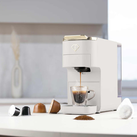 Product image of Capsule coffee maker 4in1. Part of the MATTE CREAM- GOLD . Features: • Voltage: 220-240V, 50/60Hz • Power: 1545W • 1,5L water tank • Detachable tray design • Accessories: • Nespresso small capsules holder • Dolce Gus.... (Studio view). Official Berlinger Haus product, boosted by Promintra sl.