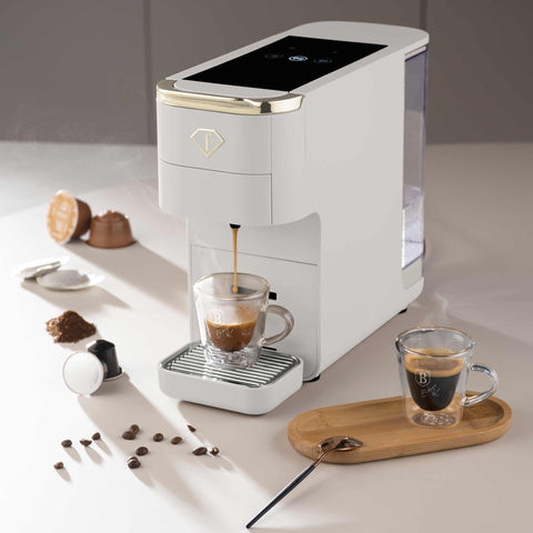 Product image of Capsule coffee maker 4in1. Part of the MATTE CREAM- GOLD . Features: • Voltage: 220-240V, 50/60Hz • Power: 1545W • 1,5L water tank • Detachable tray design • Accessories: • Nespresso small capsules holder • Dolce Gus.... (Studio view). Official Berlinger Haus product, boosted by Promintra sl.