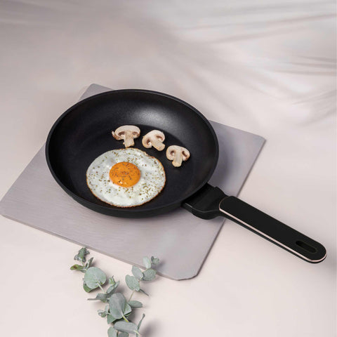 Product image of Frypan 24cm. Part of the Black Rose Collection . Features: • Material: forged aluminum with non-stick titanPro coating • Frypan Ø24*4,8 cm 1,7L • Color: matt black- rose gold REGISTERED DESIGN BY BERLINGER .... (Studio view). Official Berlinger Haus product, boosted by Promintra sl.