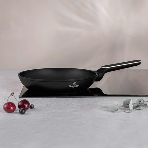 Product image of Frypan 24cm. Part of the Black Rose Collection . Features: • Material: forged aluminum with non-stick titanPro coating • Frypan Ø24*4,8 cm 1,7L • Color: matt black- rose gold REGISTERED DESIGN BY BERLINGER .... (Studio view). Official Berlinger Haus product, boosted by Promintra sl.